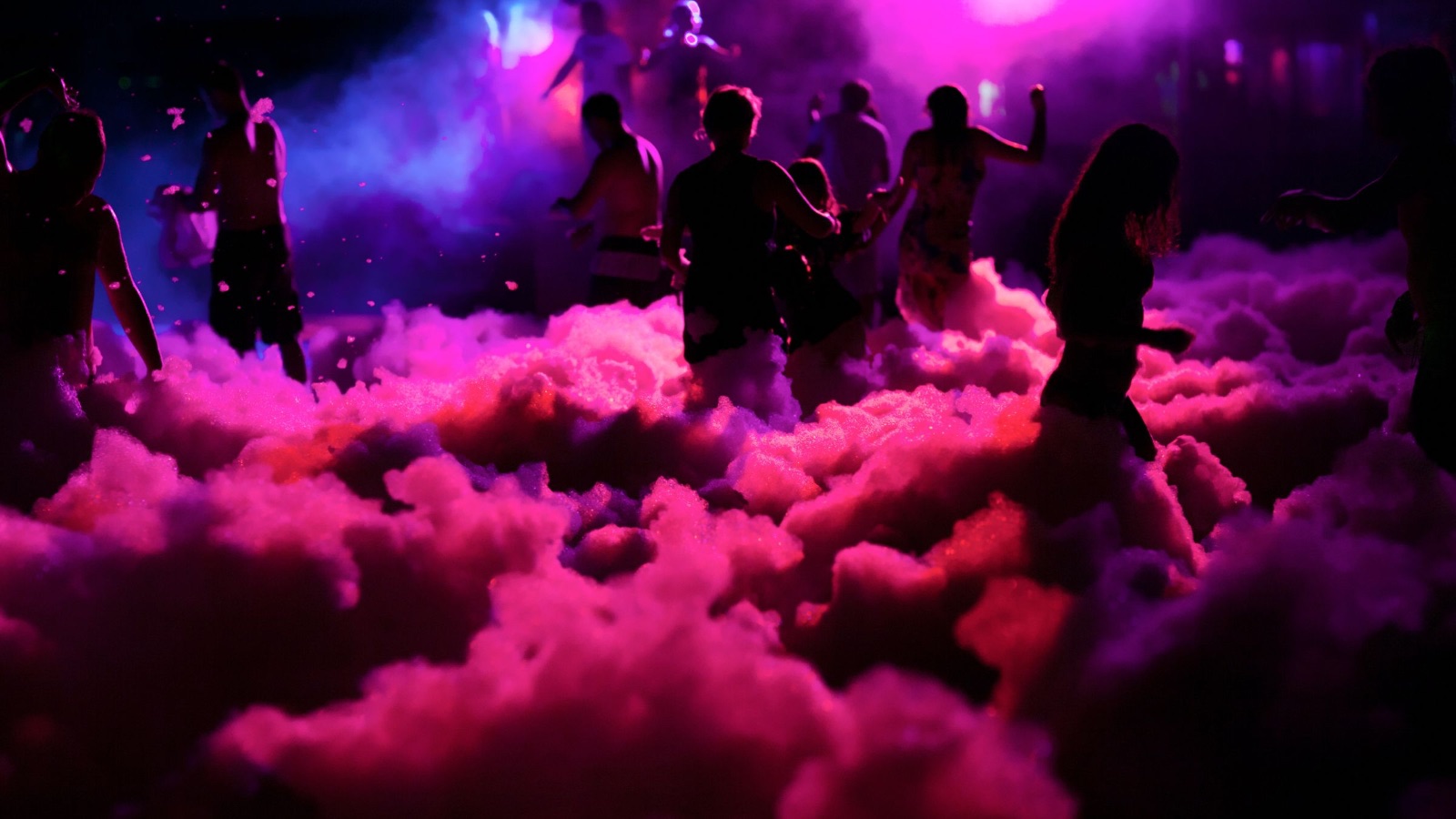 Glow foam party at night