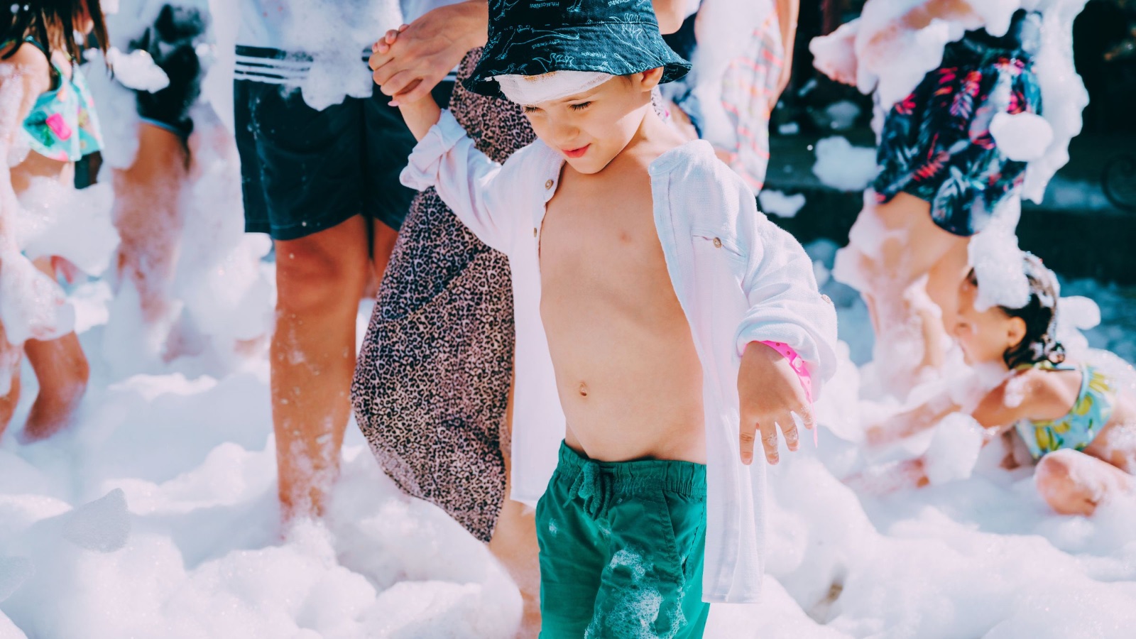 Child in a sea of bubbles